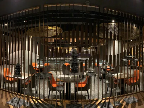 Dining room with woven pendant lights at MingHin Cuisine